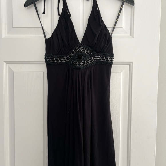 Sky dress available in 3 sizes. Decorative neckline. 93% Rayon & 7% Spandex. - Picture 3 of 7